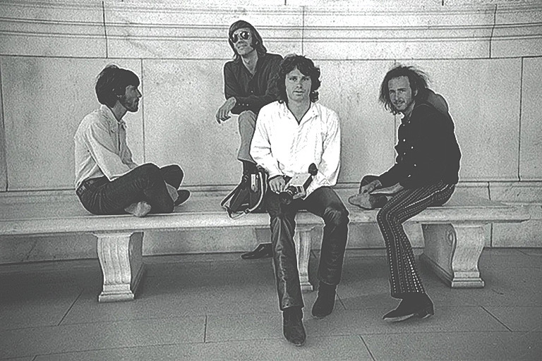 Jim Morrison (in the white shirt) and The Doors in When You're Strange.